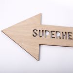 Superhero arrow sign